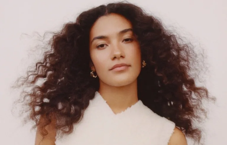 Olivia Dean Touching Toes